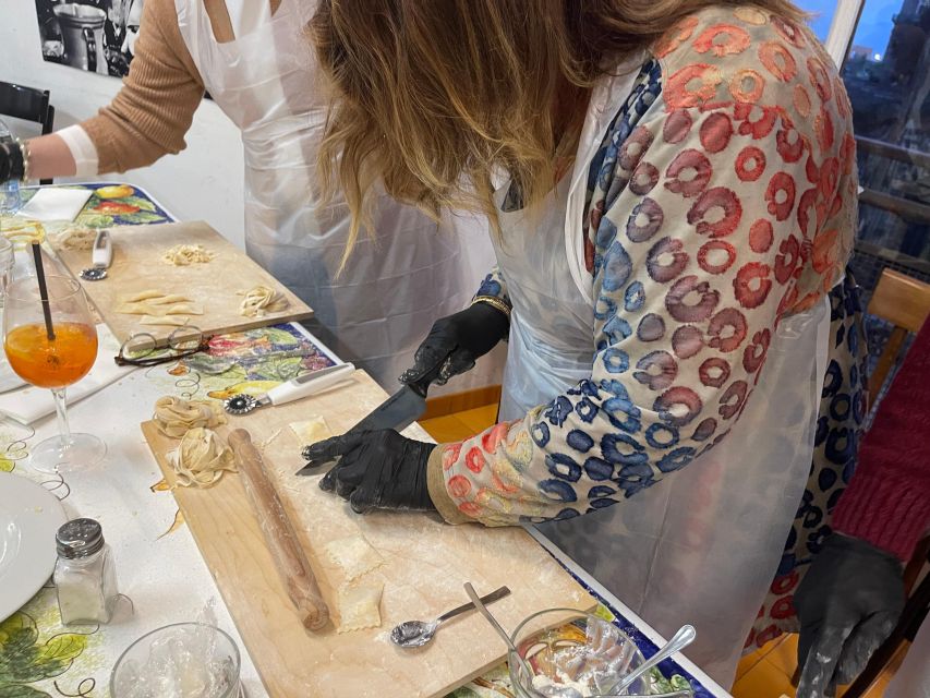 Naples: Pasta Cooking Class with Tiramisù and a Drink - Via San Carlo 17: where Naples cooking class energy starts