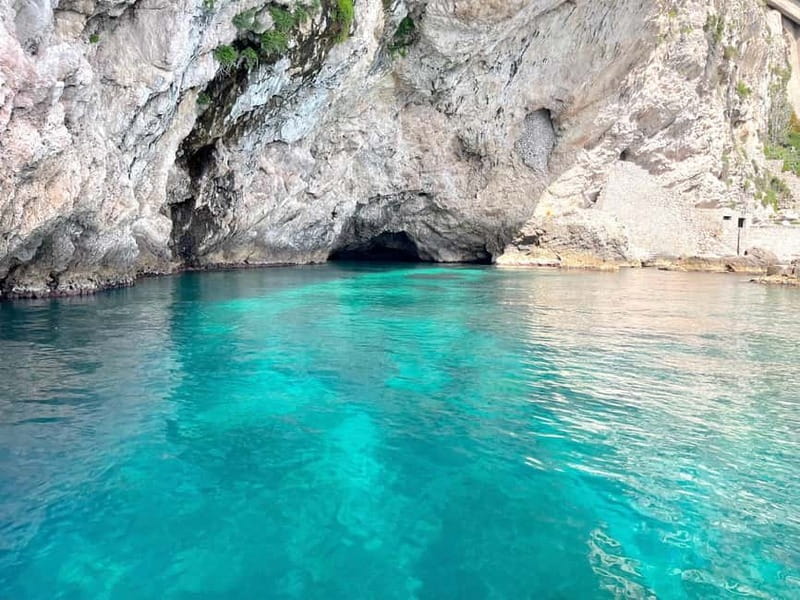 Naxos: Taormina Boat Tour with Snorkeling and Prosecco - On-board aperitivo: Sicilian Prosecco, fruit, sweets, and music