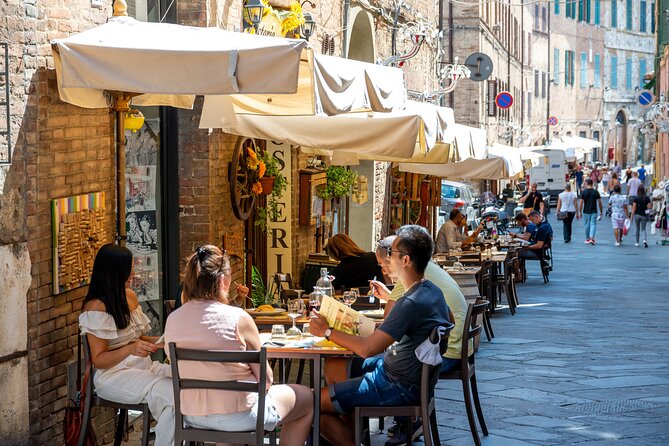 Pisa’s Ultimate Food Tour: Full Tuscan Meal by Do Eat Better - Stop 1 by the Arno: cured meats with a local red wine