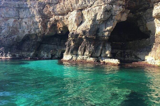 Polignano a Mare boat tour emotions, caves, diving and appetizers - Grotta Azzurra: the blue glow moment (and why timing matters)