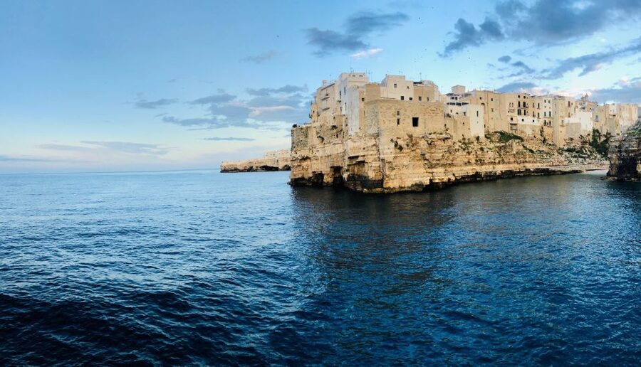 Polignano a Mare: Boat Trip, Swim & Cave with Aperitif - Finding Dorino and What the Small-Boat Experience Feels Like
