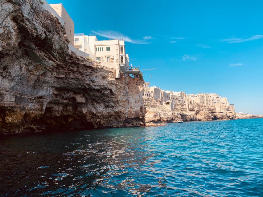 Polignano a Mare: Cave Boat Tour with Aperitif - The swim breaks in hidden coves, with ladders and floats