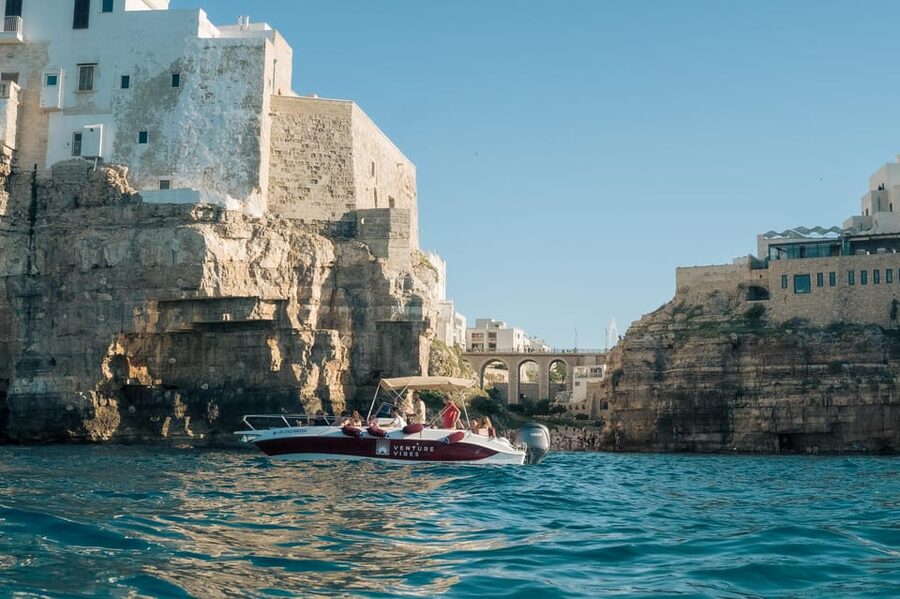 Polignano Sea Caves: Boat Tour with Snorkeling & Aperitif - Lama Monachile Beach: the view cue that Polignano is the real deal