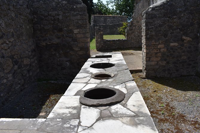 Pompeii Skip-the-line Tour with Archaeologist Guide - Theater and baths: where Pompeiians watched, worked, bathed, and gossiped
