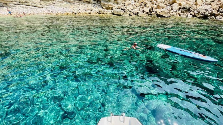Porto Conte: Half-day catamaran tour with aperitif - Cala Dragunara: swimming, snorkeling, and optional SUP time