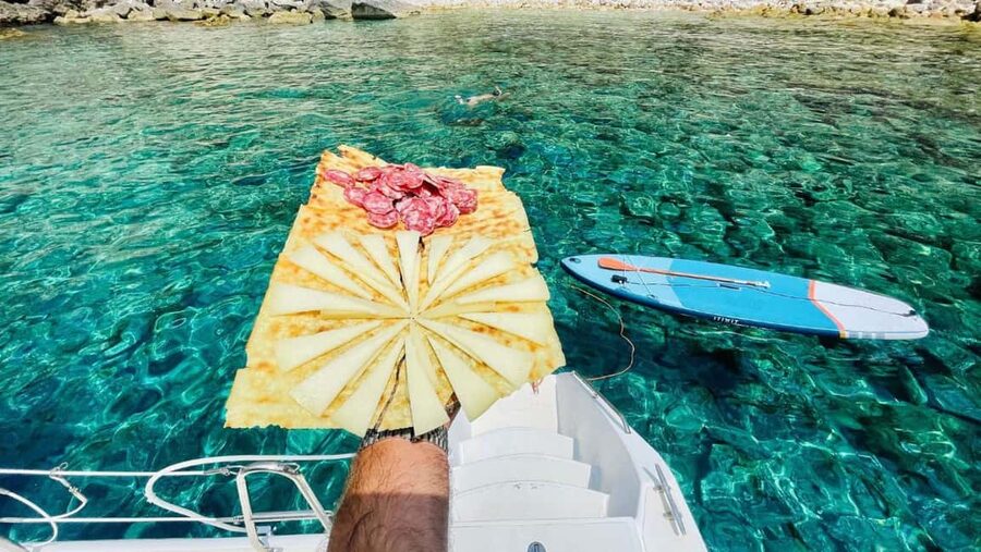 Porto Conte: Half-day catamaran tour with aperitif - The boat experience: comfort upgrades you’ll actually feel