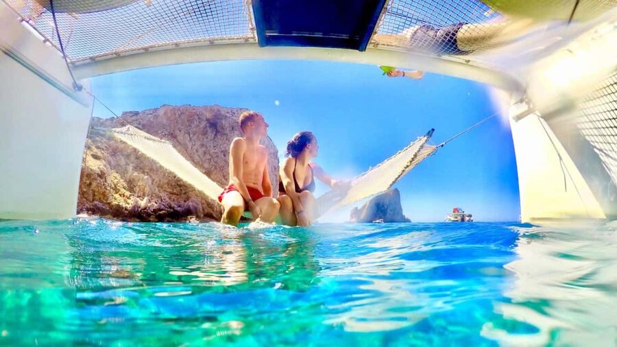 Porto Conte: Half-day catamaran tour with aperitif - Best for families? Couples? And who should skip it