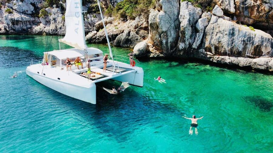 Porto Conte: Half-day catamaran tour with aperitif - The half-day catamaran format that keeps things easy