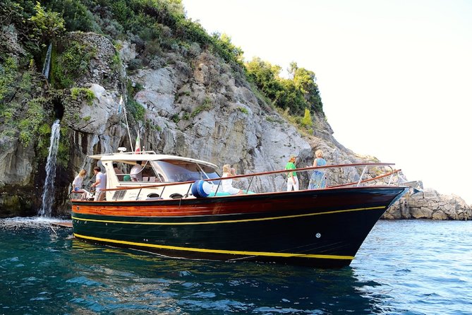 Positano & Amalfi Boat Tour from Sorrento: Swim & Light Lunch - Cruising highlights: the parts you cannot see from the road