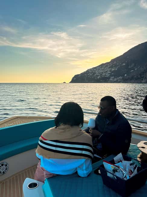 Positano: Shared Sunset Cruise - The Amalfi Coast stretch (about an hour): music, aperitif, and the best cruising pace