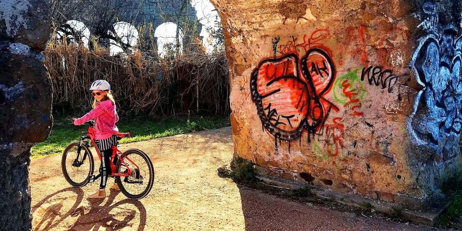 Rome: Appian Way & Catacomb Sunset E-bike Tour with Aperitif - Porta San Sebastiano and the ride’s history rhythm