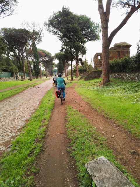 Rome: Appian Way & Catacomb Sunset E-bike Tour with Aperitif - The Appian Way into Parco degli Acquedotti: where Rome turns green