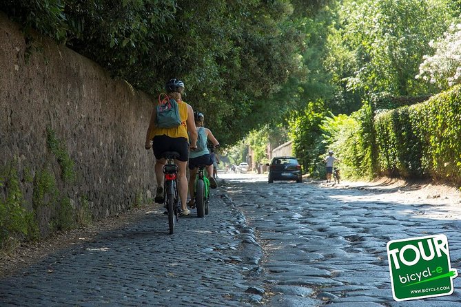 Rome:Appian Way E-bike Tour, Catacombs, Aqueducts & Transfer - The main ride on Via Appia Antica: Quiet roads, bumpy paving, and the big monuments
