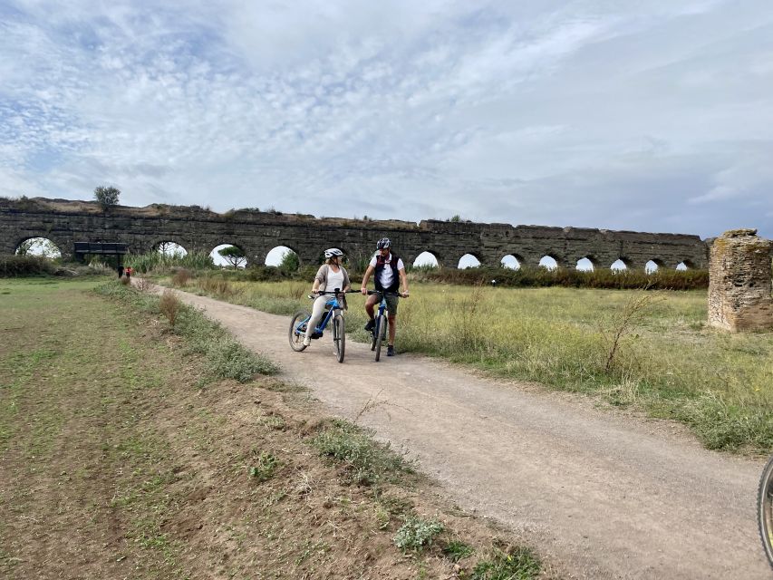 Rome:Appian Way E-bike Tour with Catacombs, Aqueducts & Food - Parco degli Acquedotti: ancient water engineering in stone and silence