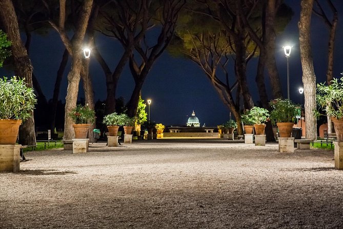 Rome by Night - Ebike Small Group Tour - Food and Wine (Option) - Piazza del Colosseo terrace finish: seeing the Colosseum lights from above
