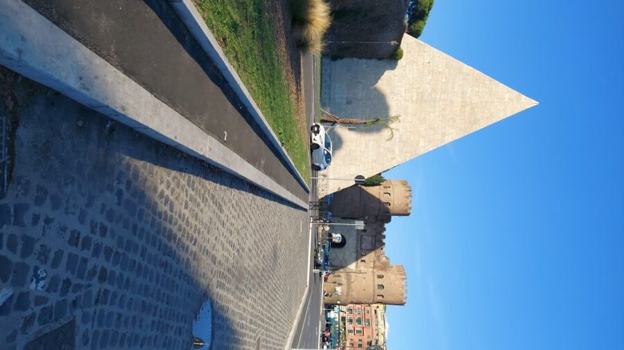Rome: Catacombs and Appian Way Golf Cart Small-Group Tour - Colosseum views from the cart, plus Caracalla’s ruins