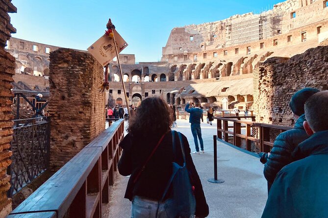 Rome: Colosseum with Arena, Roman Forum and Palatine Guided Tour - Special Colosseum entrance: how you save time in the real Rome line