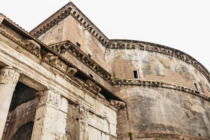 Rome: Pantheon Fast-Track Ticket and Official Audio Guide - Pink granite columns and Raphael’s burial, the portico you will remember