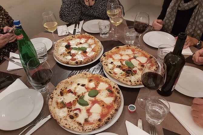 Rome: Pizza & Tiramisu Class with Free Flowing Fine Wine - Restaurant Setting, Group Size, and Possible Awkward Moments