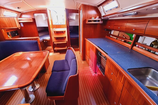 Sailboat tour from PALAU to the Maddalena Archipelago. - The Onboard Food and Wine Setup Is Part of the Experience