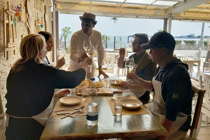 Seaview Cooking Class & Taormina local flavors with Chef Mimmo - Wine, cheese and salami tastings, and lunch steps from the beach