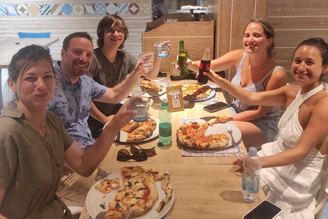 Semi-Private Pizza Making Experience in Naples with Drink - Choosing margherita or marinara, then topping with real ingredients