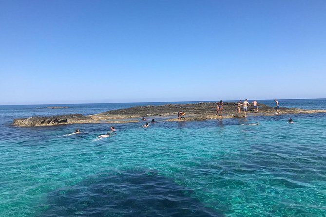 Shared snorkeling tour from Tropea to Capo Vaticano - Stop 4: Spiaggia di Riaci, one more cover-and-go swim