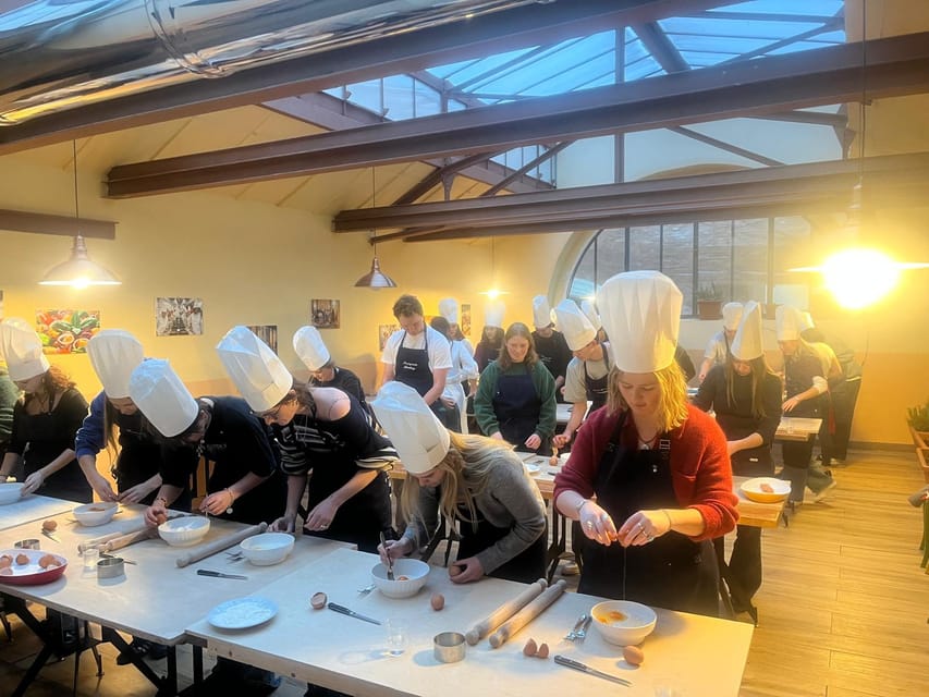 Siena: Pasta and Tiramisu Cooking Class with Wine - Entering Trattoria Fonte Giusta for Prosecco and Aprons