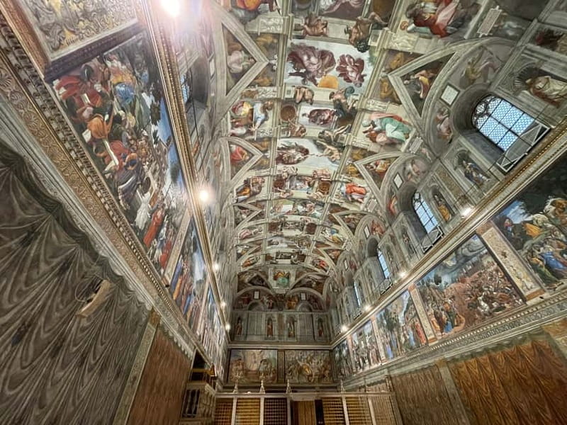 Sistine Chapel and Vatican Museums Small Group Tour - The Vatican Museums route: Candelabra Gallery, tapestries, and maps