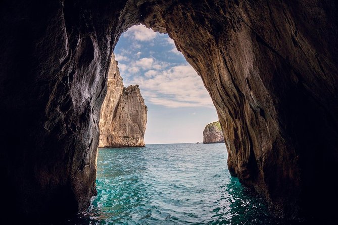 Small Group Capri Island Boat Ride with Swimming and Limoncello - Capri from Marina Grande, with a small-boat feel