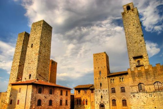 Small-Group San Gimignano and Volterra Day Trip from Siena - The Collegiata Interior: Exterior Looks Plain, Then You Look Closer