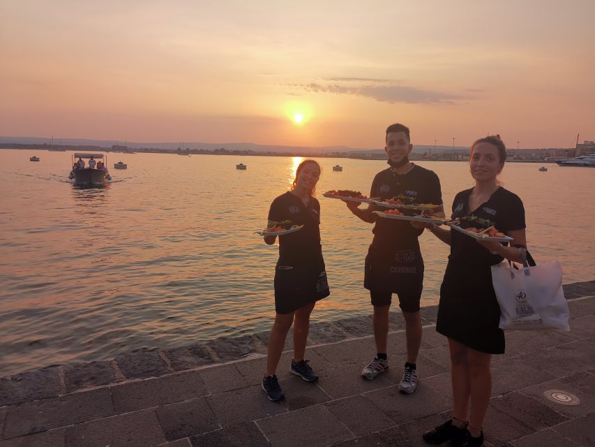 Syracuse: Ortigia Sunset Cruise with Aperitif - Grotta delle Stalattiti: colors and shapes created by waves and humidity