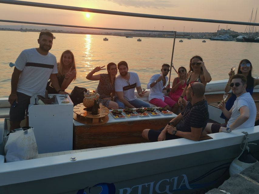 Syracuse: Ortigia Sunset Cruise with Aperitif - Arethusa Spring and extra time for water and photos