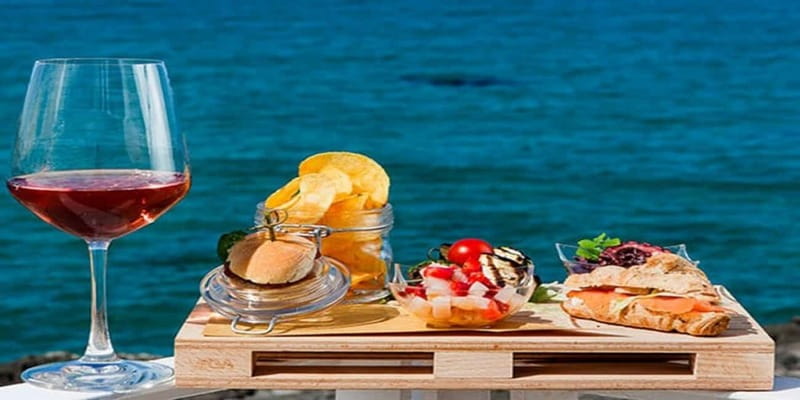 Taormina: Boat Tour with Aperitif on Isola Bella - Aperitif on the water: fruit, almond treats, and a relaxing vibe
