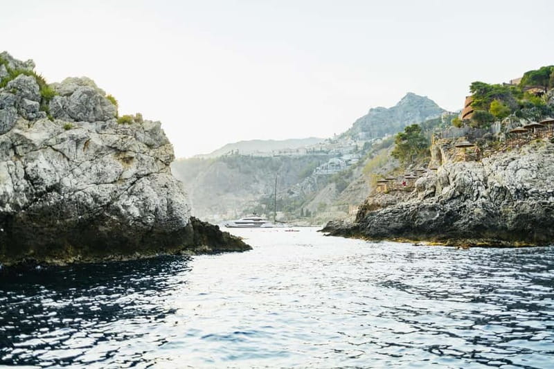 Taormina: Sunset Boat Tour with Dolphin Watching & Aperitif - Who should book this tour, and who should skip it