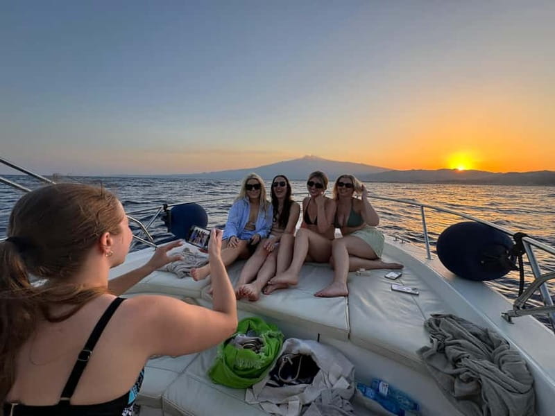 Taormina: Sunset Boat Tour with Dolphin Watching & Aperitif - The cave stops: Grotta del Giorno, Grotta delle Sirene, and more
