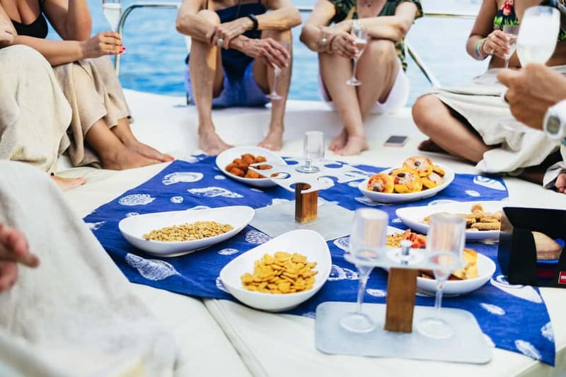 Taormina: Sunset Boat Tour with Dolphin Watching & Aperitif - Aperitivo onboard: snacks, drinks, and that post-swim feeling