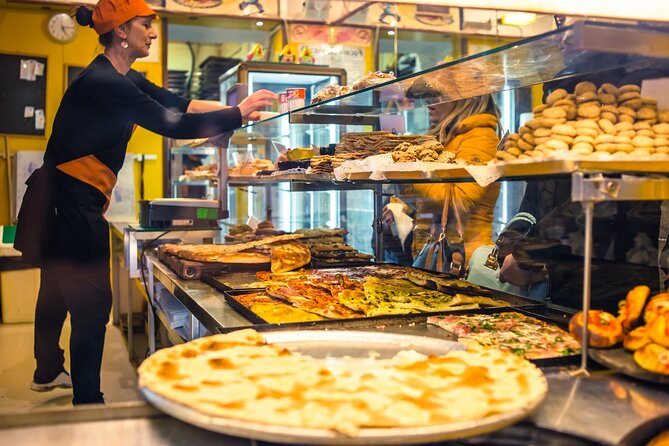 Taste Genoa: A Full Meal Walking Food Tour by Do Eat Better - Stop 2: Recco-style cheese focaccia with Stracchino (the gooey center)