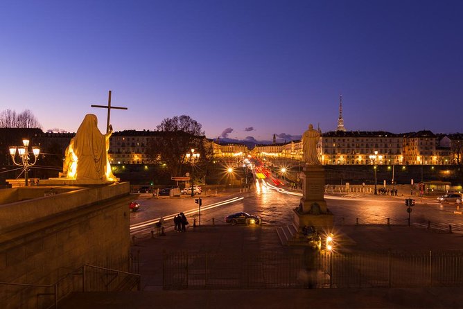 Torino Magica® Evening Tour - Stop 1: Piazza Statuto and Turin’s black magic center