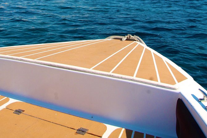 Tour of the island of Ortigia and exploration of sea caves with baths. - Why a Boat View Beats the Heat in Ortigia