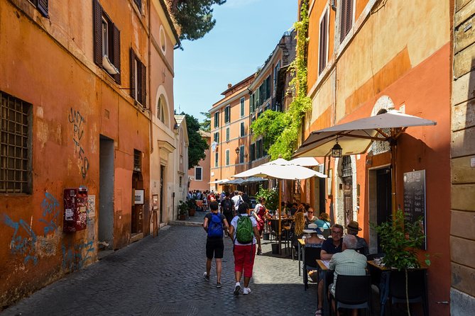 Trastevere and Rome's Jewish Ghetto Half-Day Walking Tour - Stop 3: Trastevere walking, people-watching, and the Santa Maria plan