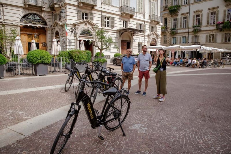 Turin: City Highlights Guided E-Bike Tour - Piazza Carignano and the UNESCO old-city feeling