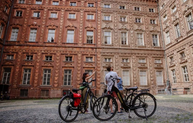 Turin: City Highlights Guided E-Bike Tour - Po River bridge, Valentino Park, and the lively San Salvario return