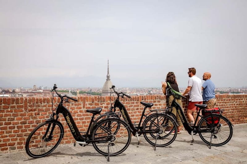 Turin: City Highlights Guided E-Bike Tour - Getting oriented fast: Piazza San Carlo and the Savoy heart