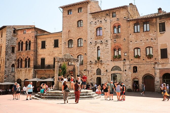 Tuscany: Day Trip to Pisa, Siena, San Gimignano, and Chianti - San Gimignano: towers, Piazza della Cisterna, and walls for panoramic views