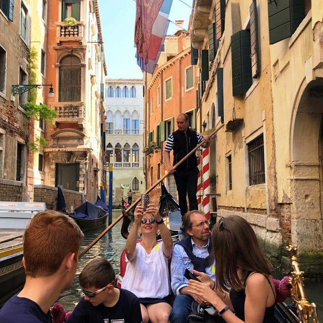 Venice: Private Grand Canal Gondola Ride from Rialto - Timing, weather, and flood-level route changes