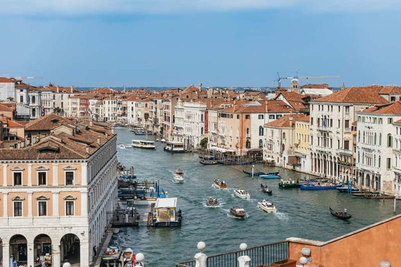 Venice: Rooftop Terraces Tour with Prosecco - Stop 2 at the first terrace: coffee, skyline views, and orientation