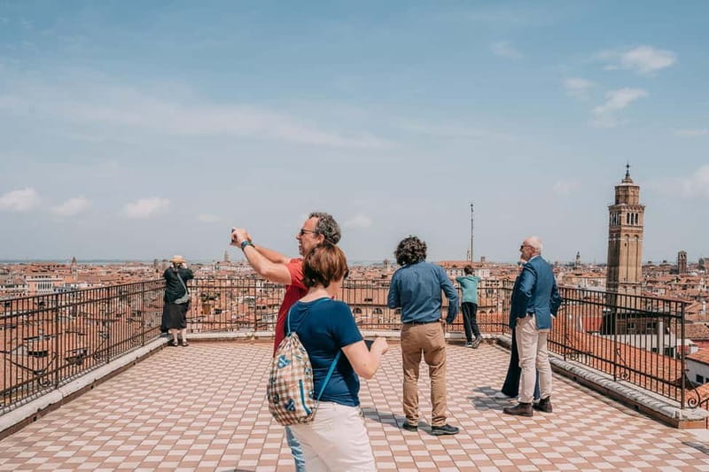 Venice: Rooftop Terraces Tour with Prosecco - Final terrace at Splendid Venice: Prosecco with snacks above the rooftops
