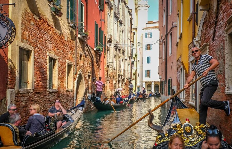 Venice: Shared Gondola Ride through the Lagoon City - Velvet-seat relaxation, with sound and balance doing the talking