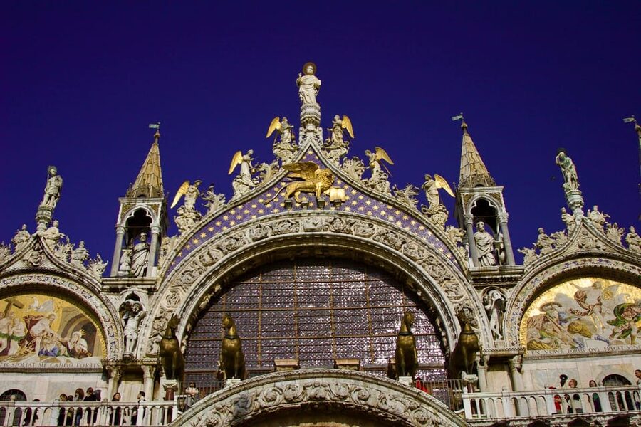 Venice: St. Mark's Basilica Ticket with Audio Guide - Inside St. Mark’s Basilica: five domes, marble columns, and mosaic coverage